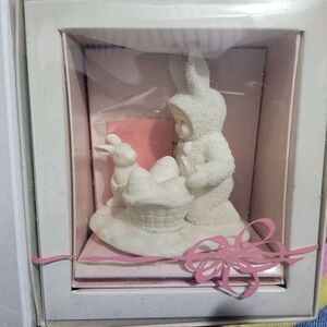 This is a Department 56‎ Springtime Stories of the Snowbunnies figurine entitled